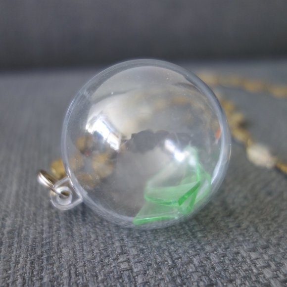 Broken Uranium Glass Inside Plastic Ornament with Metal Necklace - Picture 2 of 10